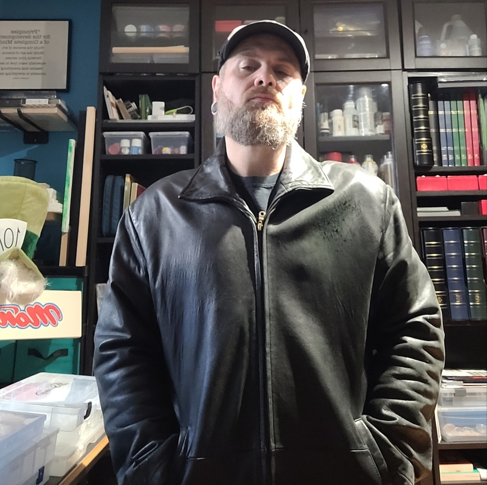 Leather jacket with lining.